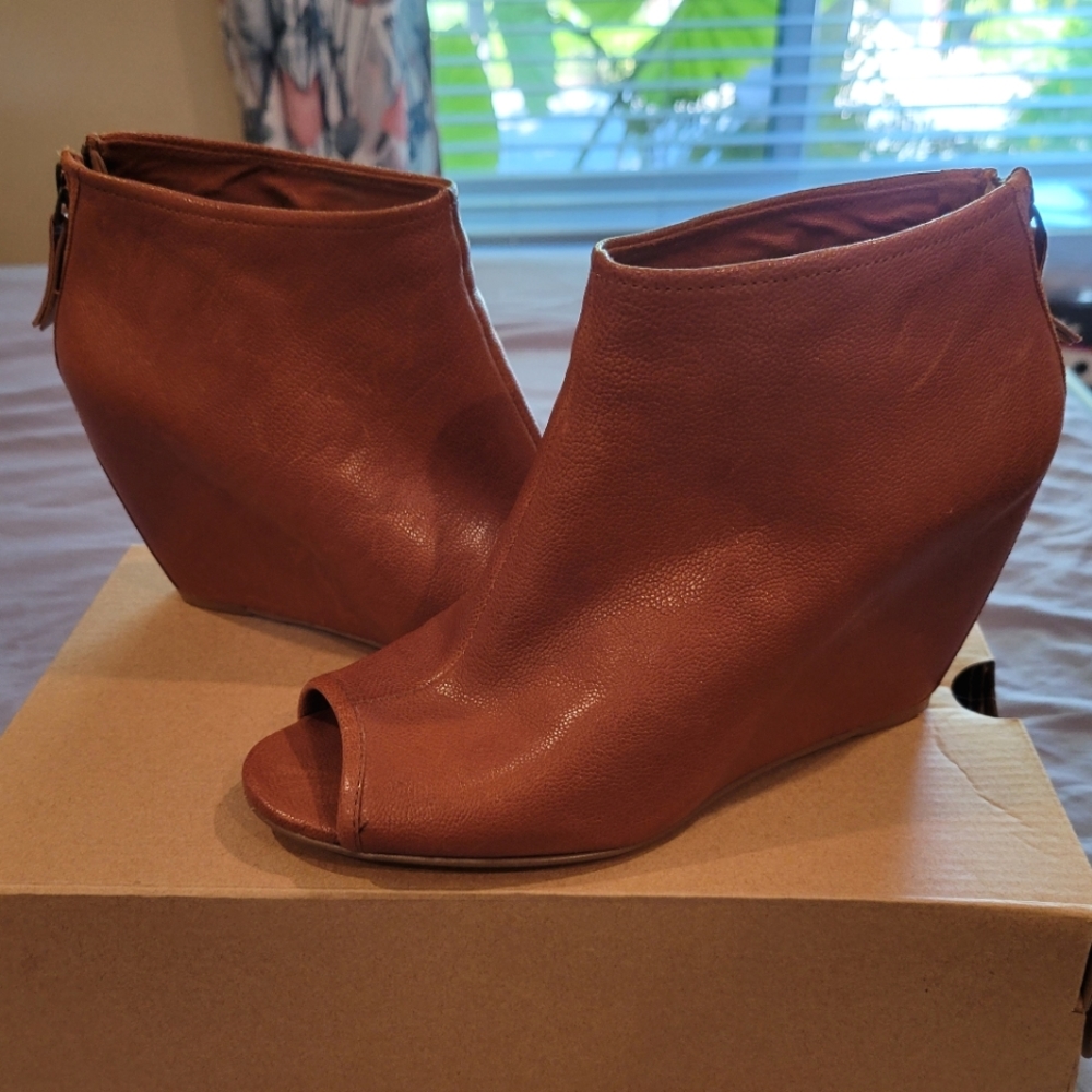 Peep toe hidden heel booties